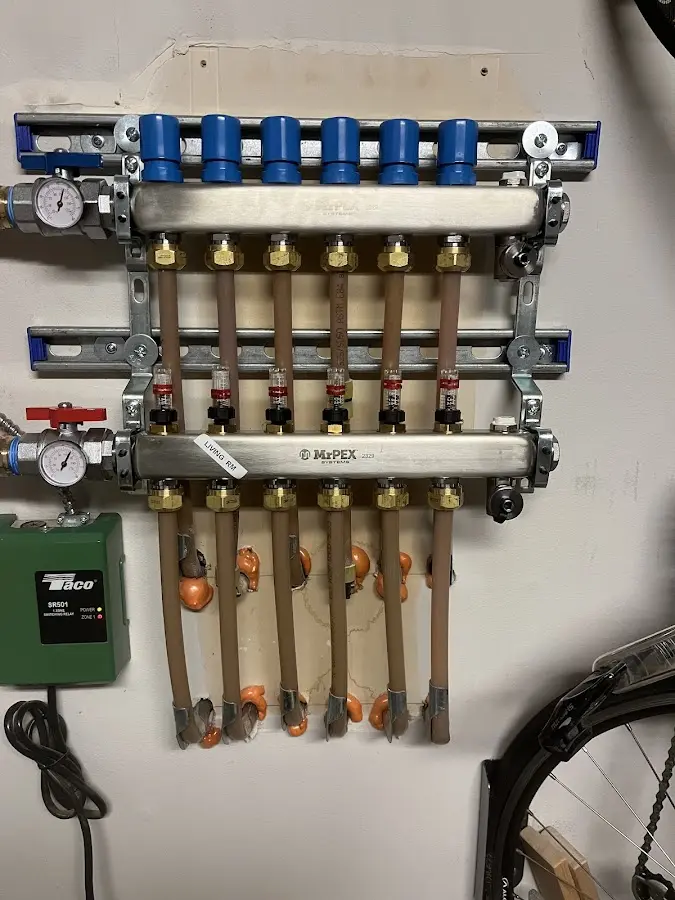 Plumber performing Gas Line Installation at a residential property in Glenwood Springs